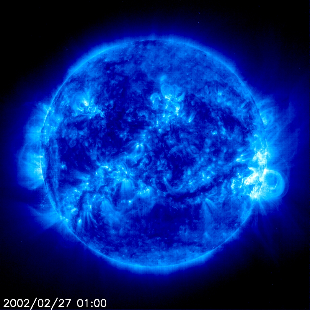 Large magnetic loops seen by the SOHO satellite